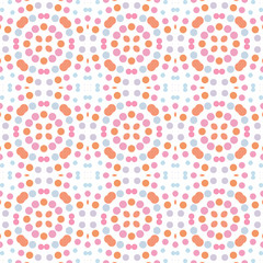 Seamless abstract pattern background with a variety of colored circles.