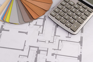 samples of building materials, housing plan, calculator. repair, construction
