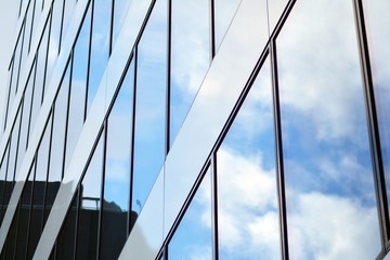 Fototapeta na wymiar Modern office building on a clear sky background