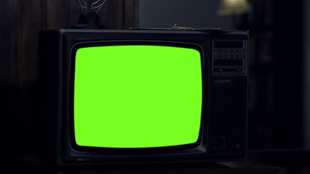 80s TV Turning On Green Screen. Night Tone. You can replace green screen with the footage or picture you want with &ldquo;Keying&rdquo; effect in After Effects (check out tutorials on YouTube). 