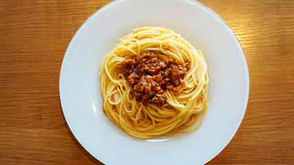 Plate of delicious spaghetti Bolognaise or Bolognese with sauce
