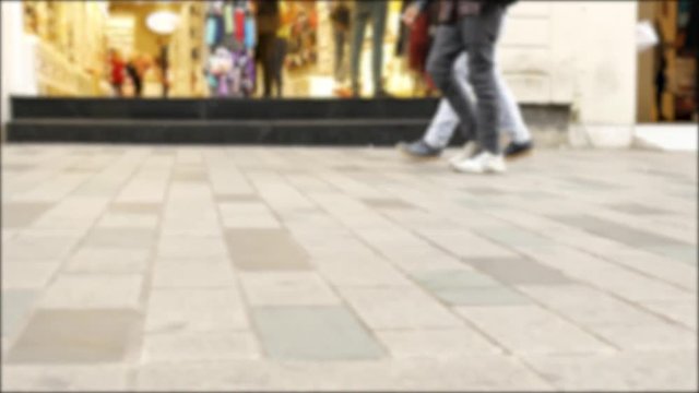 Blurred Feet Of A Crowd Of People On The Street