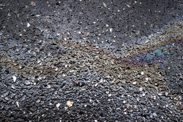 Oil spill wet asphalt pavement  texture surface