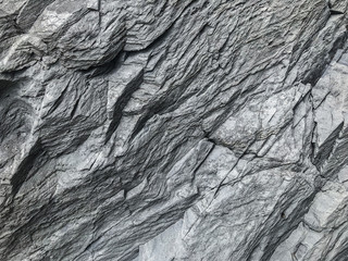 natural black stone surface texture wall background.