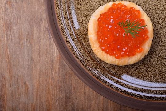 Close-up of red caviar in a tartlet