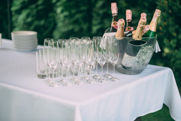passover traditional four glasses of wine with wine bottle on studio white background