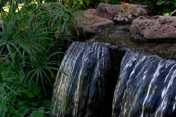 Fototapeta na wymiar waterfalls, garden arrangement, waterfalls in the garden.