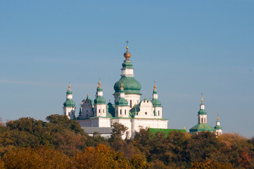 Fototapeta na wymiar Beautiful autumn landscape nature and church. Ukraine, Chernihiv city, Trinity Cathedral