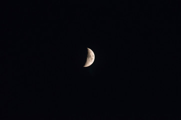 Moon in the night sky. Night sky with a month