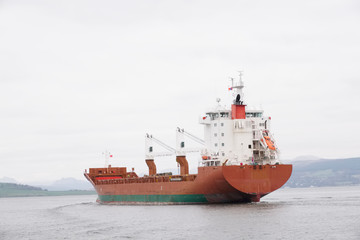 Cargo ship vessel freight containers carrier transport on sea ocean to port dock