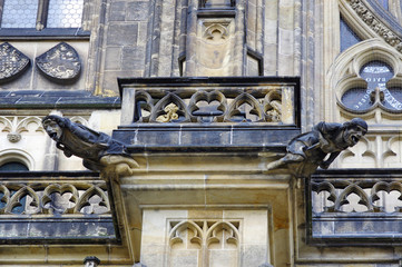 Fototapeta na wymiar Close view of the gargoyles on the outer walls of St. Vitus Cathedral at Prague, Czech Republic