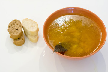 soup with bread, white tabel background