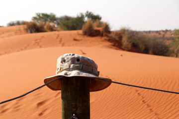 safari hat with beautiful view in the kalahari desert - Namibia