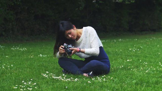 Photographying flowers from an Asian Beautiful Photogrpaher