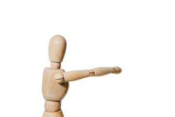 A wooden mannequin shows with his hand. The concept of pointing at someone with your finger. The mannequin on a white background will stretch out his hand.