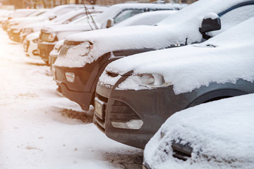 Parked cars in the winter close-up