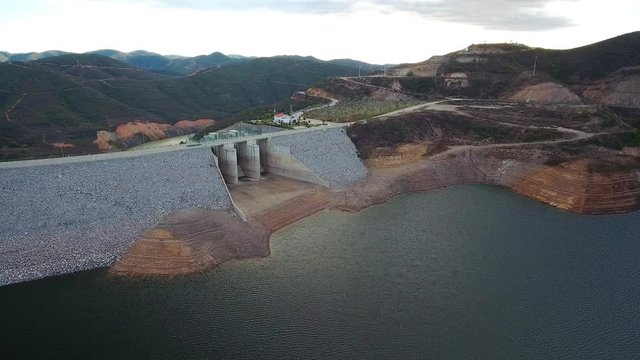 Aerial. Portuguese hydroelectro dam Odelouca, in mountains of Monchique. Algarve Portugal