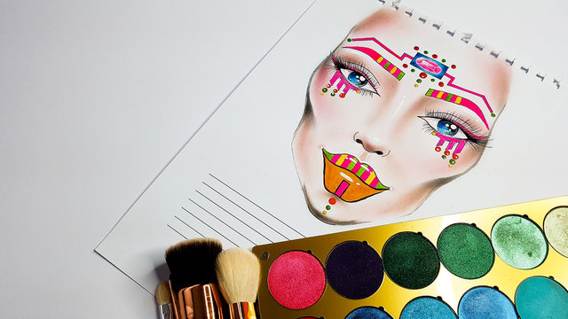 Kolorowy, artystyczny facechart z cieniami do powiek i pędzlami do makijażu na białym tle 