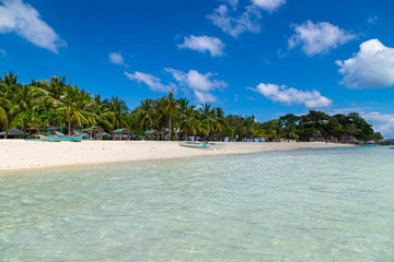 Fototapeta na wymiar Amazing tropical beach on the island Malcapuya. Beautiful tropical island with white sand and palm trees. Palawan, Philippines.