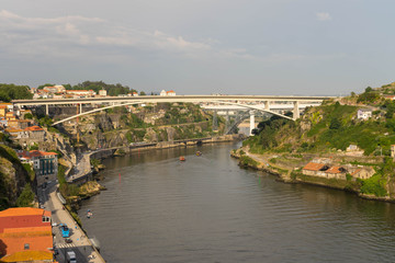 Fototapeta na wymiar View of Porto in Portugal. Douro floating in valley.