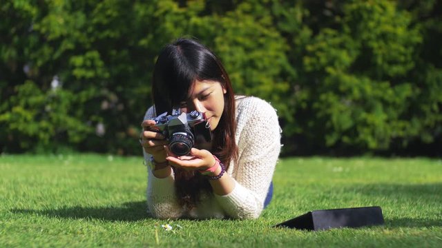 Photographying flowers from an Asian Beautiful Photogrpaher