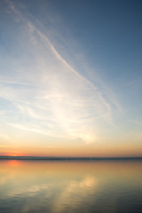 Obraz premium Beautiful red sunset over lake. Composition of nature.