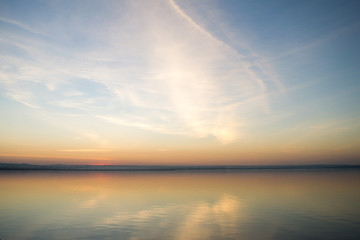 Fototapeta premium Beautiful red sunset over lake. Composition of nature.