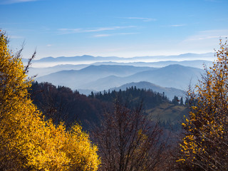 Naklejka na ściany i meble Beskids Mountains in Autumn from Jaworzyna Range nearby Piwniczna-Zdroj town, Poland. View to the south.