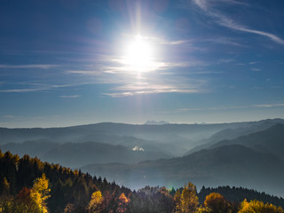 High Tatras and Radziejowa Range from Jaworzyna Range (Beskids Mountains) nearby Piwniczna-Zdroj, Poalnd. Backlit sun.