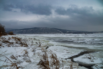 river, mountains, shore, trees, ice, snow, grey, sky, clouds, winter, walk