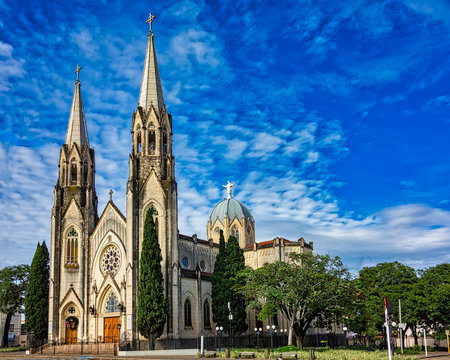 Cathedral church of Botucatu under blue sky with clouds at dawn