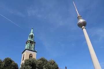 Berlin TV Tower and St. Mary's Church at Alexanderplatz in Berlin, Germany © ClaraNila