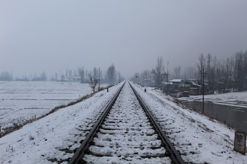 A railway track covered in snow in kashmir