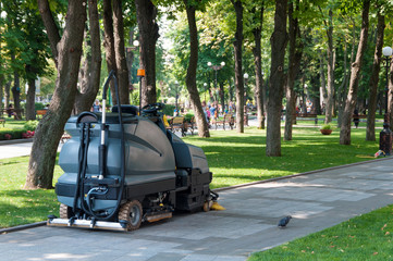 sidewalk cleaning machine in the park