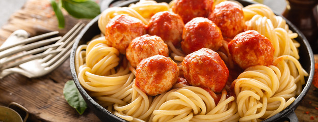 Spaghetti with tomato sauce and meatballs. Banner