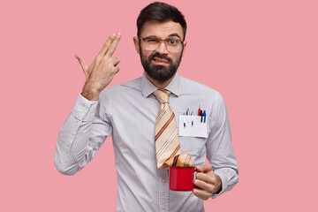Diasappointed unshaven prosperous marketing expert shoots himeself in temple, feels frustrated, has...