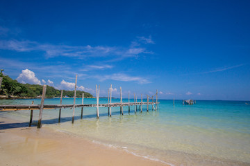 Wooden platform entering the turquoise sea