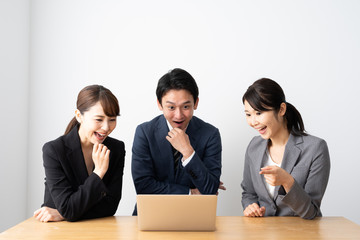 asian business group using laptop