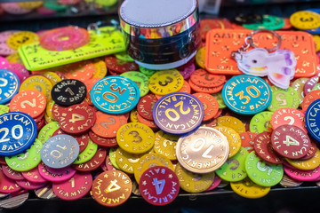Colorful poker chips in casino machine to win prizes