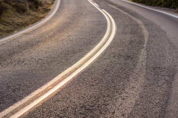 car road turn asphalt material background surface texture infrastructure and transportation concept