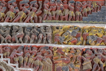 Terracotta art on the wall of Hindu temple , India