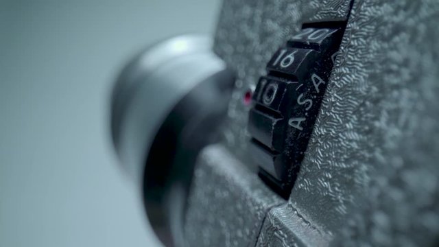 Vintage ASA Film Settings. Macro product shot extreme close up (ECU) on the parts and details of an old Revere (Model 119-D) 8mm film camera.