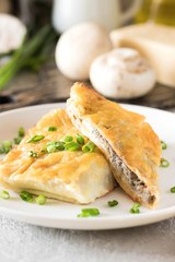 Béchamel baked pancakes stuffed with mushrooms