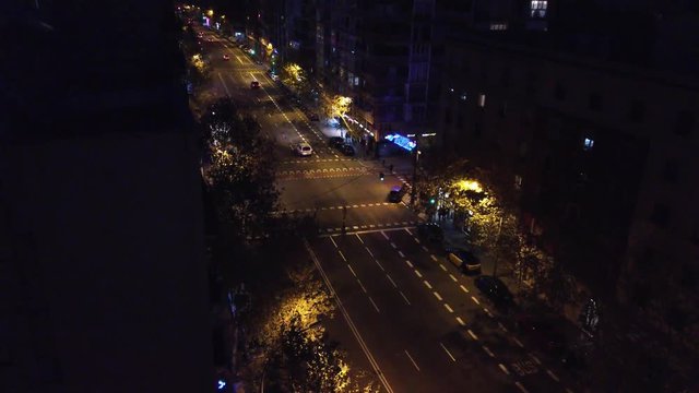 Aerial view of street in Barcelona at night. 4k Video