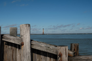 Obraz na płótnie Canvas THe decommissined Morris Island Lighthouse at the entrance to Charleston Harbor in South Carolina