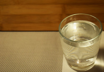 Glass with clear drinking water.  Healthy eating and weight loss.