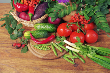 Various appetizing vegetables on the kitchen board. Close-up. 