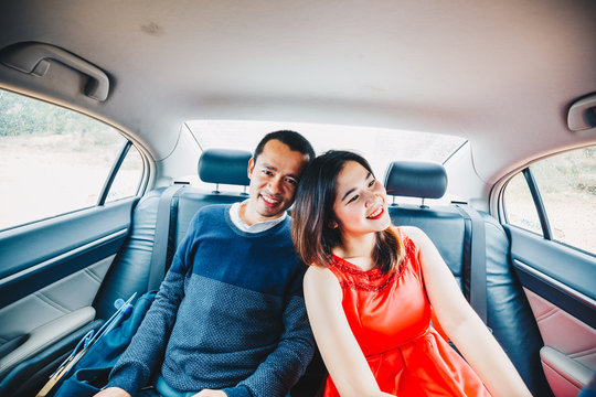 Romantic couple of love travel in modern car