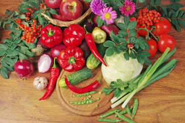 A variety of delicious vegetables on the kitchen board. 