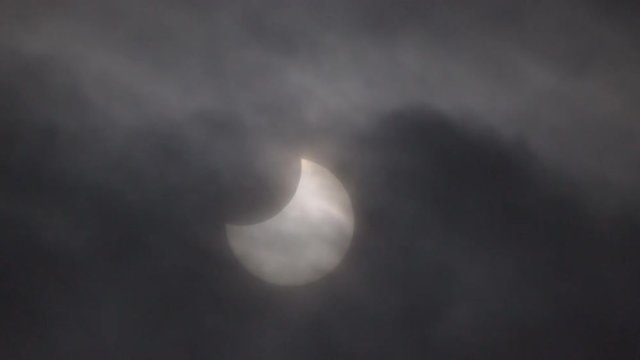 Tokyo,Japan-January 6, 2019: A partial solar eclipse observed in Tokyo, Japan, around 10AM.